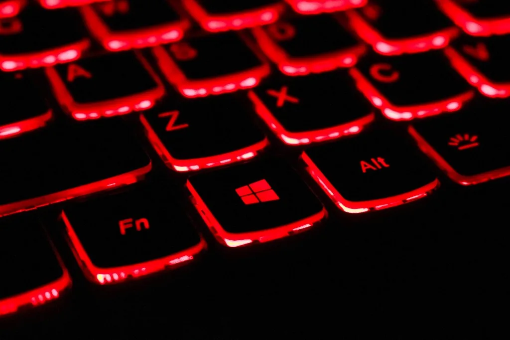 Laptop keyboard lit with red backlight
